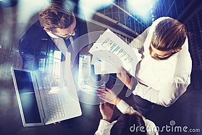 Business people work in the office with statistic worksheets. concept of teamwork and business. double exposure Stock Photo