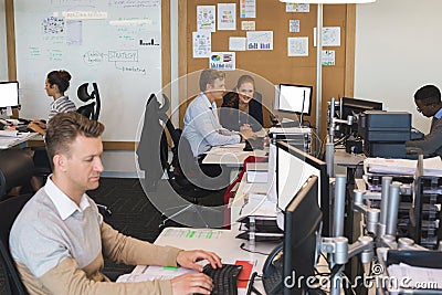 Business people working on computers at office Stock Photo