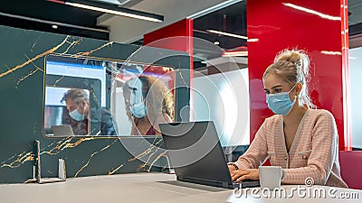 Business people working in public places with partition to keep social distancing Stock Photo