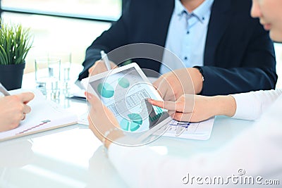 Business person analyzing financial statistics Stock Photo