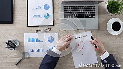 Business person drawing question mark on business plan, lack of ideas, top view Stock Photo