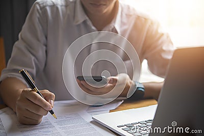 Business person Writing contract law and paper work for business and finance, write document, complete job application forms, Stock Photo