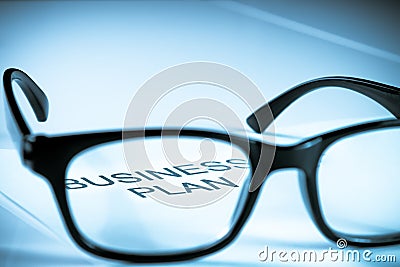 Business plan words see through glasses lens, business concept Stock Photo