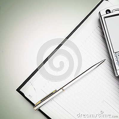 Business planner with a pen and a phone Stock Photo
