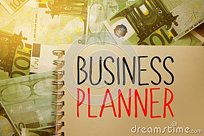 Business Planner words on copybook on 100 Euro bills. Strategical Concept Stock Photo