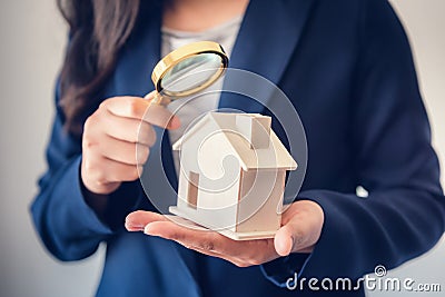 Business Real Estate and Residential Investment Concept, Broker Sell Agency of Property Estates Investigation By Magnifying Glass Stock Photo