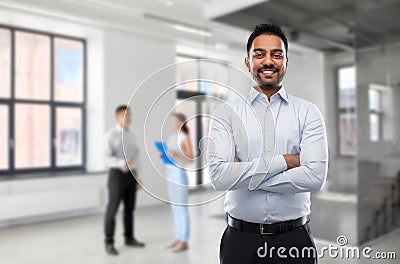 Indian businessman or realtor in empty office room Stock Photo