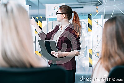 Business revenue analysis speaker presentation Stock Photo