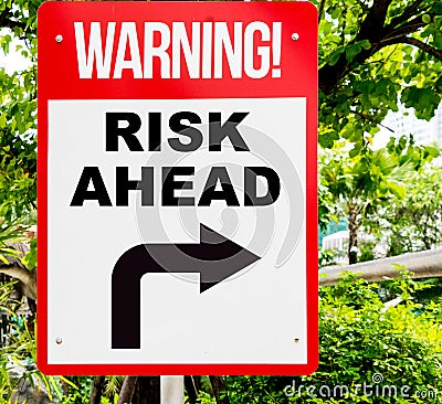 Business Risk Ahead warning sign turning right Stock Photo