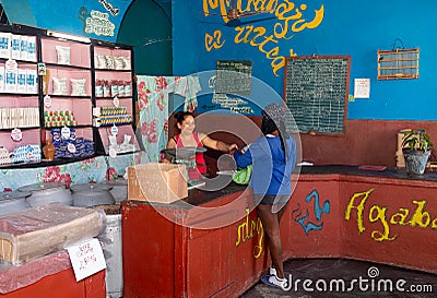 Business in a shop of Trinidad, Cuba Editorial Stock Photo