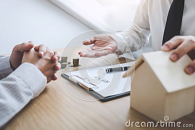 Business Signing a Contract Buy - sell house, insurance agent analyzing about home investment loan Real Estate, Concept mortgage Stock Photo