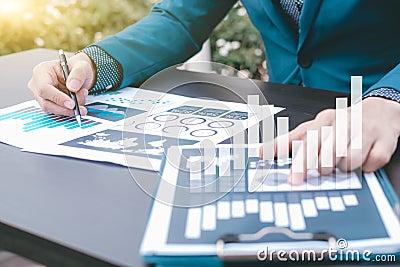 business statistics success concept : businessman analytics financial chart and graph Stock Photo