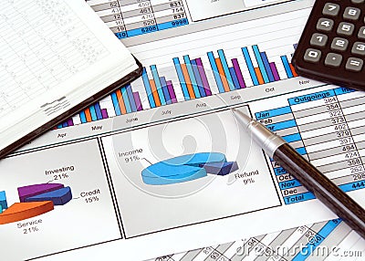 Business Still Life with Graphs Stock Photo