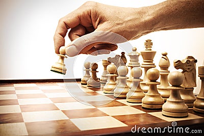 Business Strategy Chess Move Hand Stock Photo