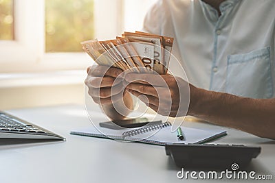 Business success - businessman counting cash money Stock Photo