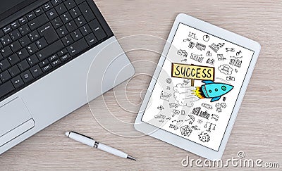 Business success concept on a digital tablet Stock Photo