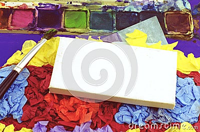 Business success concept over small white canvas frame on crumple texture color paper, Stock Photo