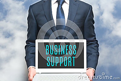 Business support advisor offers online help to businesss. Consultant worker in business suit Stock Photo