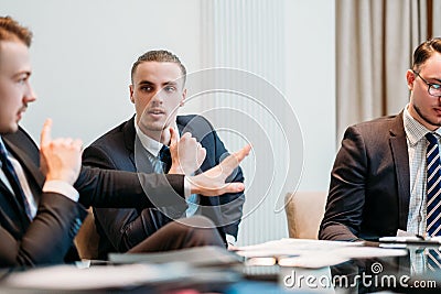 Business team argument debate paper discussion Stock Photo