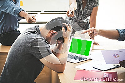 Business team blaming frustrate young colleague Stock Photo