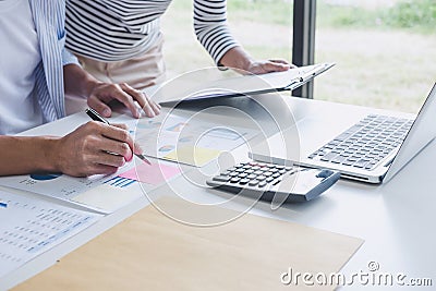 Business team collaboration discussing working analysis with financial data and marketing growth report graph in team, Meeting Stock Photo