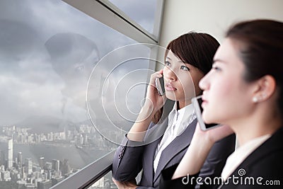 Business team look city through window Stock Photo