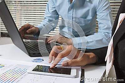 Business team meeting. Photo professional investor working planing the project. Finance task. Digital tablet laptop computer smart Stock Photo