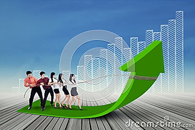 Business team pulling up business bar Stock Photo