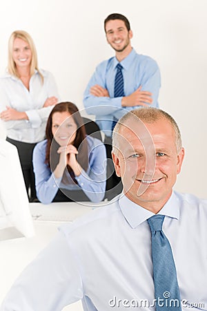 Business team senior manager with happy colleagues Stock Photo