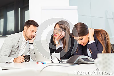 Business team sitting sad and solving problem in office Stock Photo