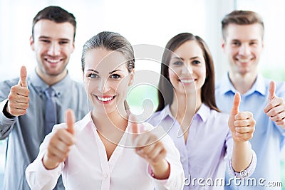 Business team with thumbs up Stock Photo