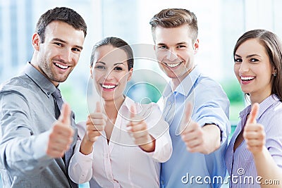 Business team with thumbs up Stock Photo