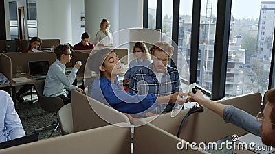 Business team working in office. Employees discussing financial documents Stock Photo