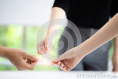 Business teamwork, partnership and brainstorm concept. Group of business people assembling jigsaw puzzle Stock Photo