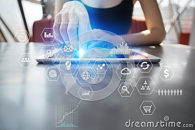 Business and technology concept. Graphs and icons on virtual screen background. Stock Photo