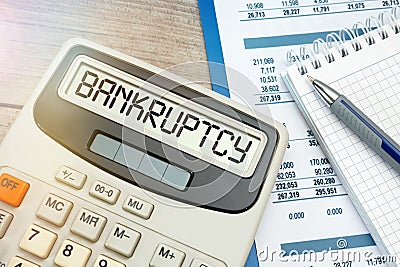 Business, Technology, Internet and network concept. Inscription BANKRUPTSY on calculator Stock Photo