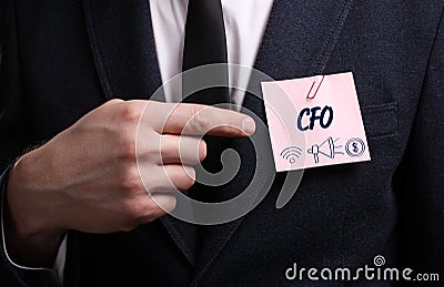 Business, Technology, Internet and network concept. Young businessman shows the word: CFO Stock Photo