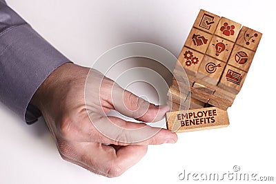 Business, Technology, Internet and network concept. Young businessman shows the word: Employee benefits Stock Photo