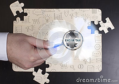 Business, Technology, Internet and network concept. Young businessman shows the word: Excise tax Stock Photo