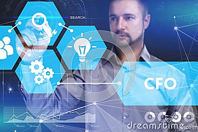 Business, Technology, Internet and network concept. Young businessman shows the word on the virtual display of the future: CFO Stock Photo