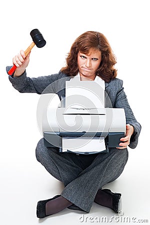 Business woman angry on her printer Stock Photo