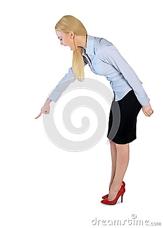 Business woman angry pointing down Stock Photo