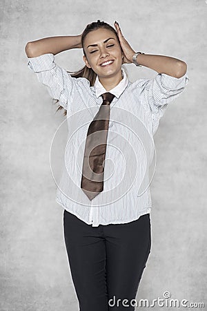 Businesswoman arranges her hair, seductive movements Stock Photo