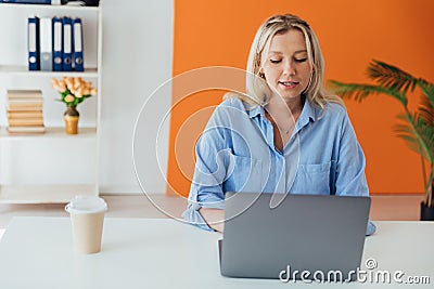 Business Woman Blonde With Laptop Small Business Online Stock Photo