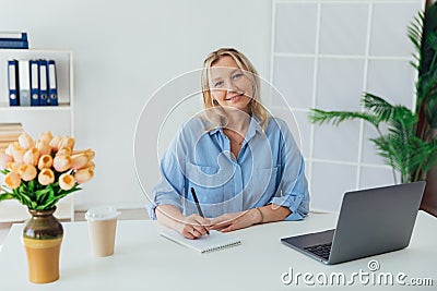 Business Woman Blonde With Laptop Small Business Online Stock Photo