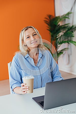 Business Woman Blonde With Laptop Small Business Online Stock Photo