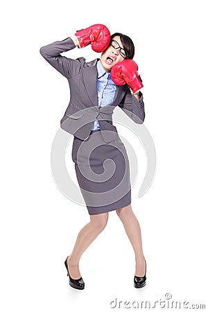 Business woman boxing and knock down itself Stock Photo