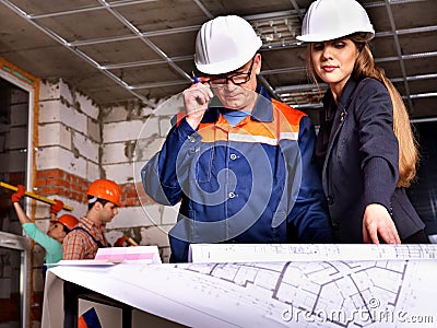 Business woman in builder helmet . Stock Photo