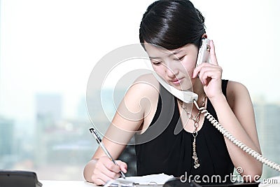 Business woman busing on phone Stock Photo