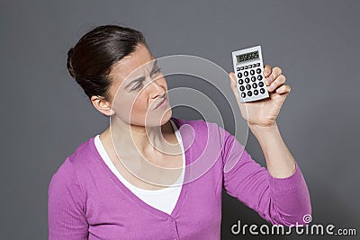 Business woman with calculator Stock Photo